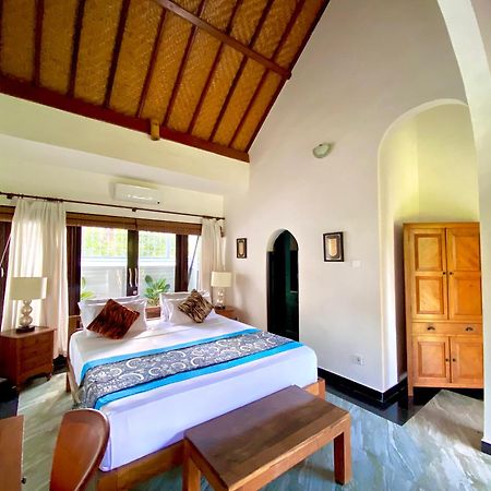 Hotel Puri Ayu à Canggu Extérieur photo