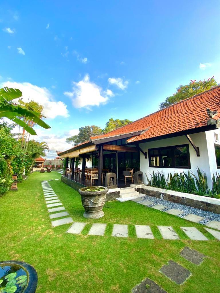 Hotel Puri Ayu à Canggu Extérieur photo