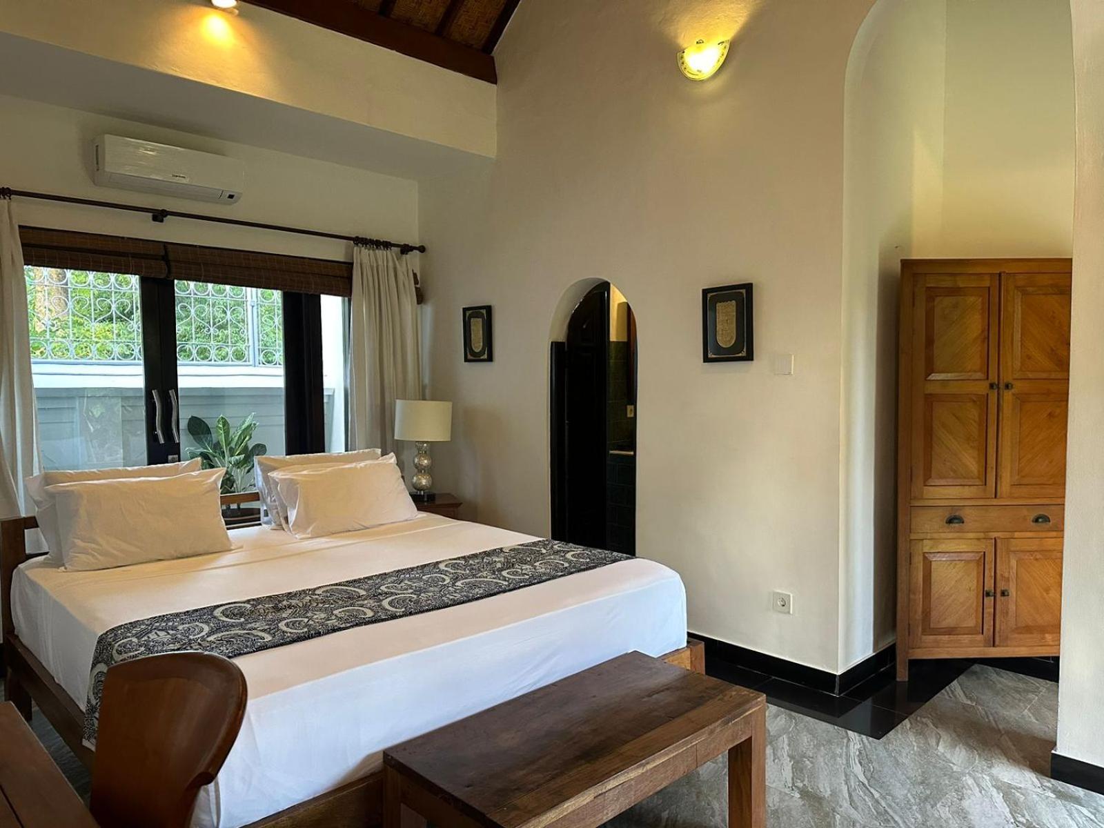 Hotel Puri Ayu à Canggu Extérieur photo