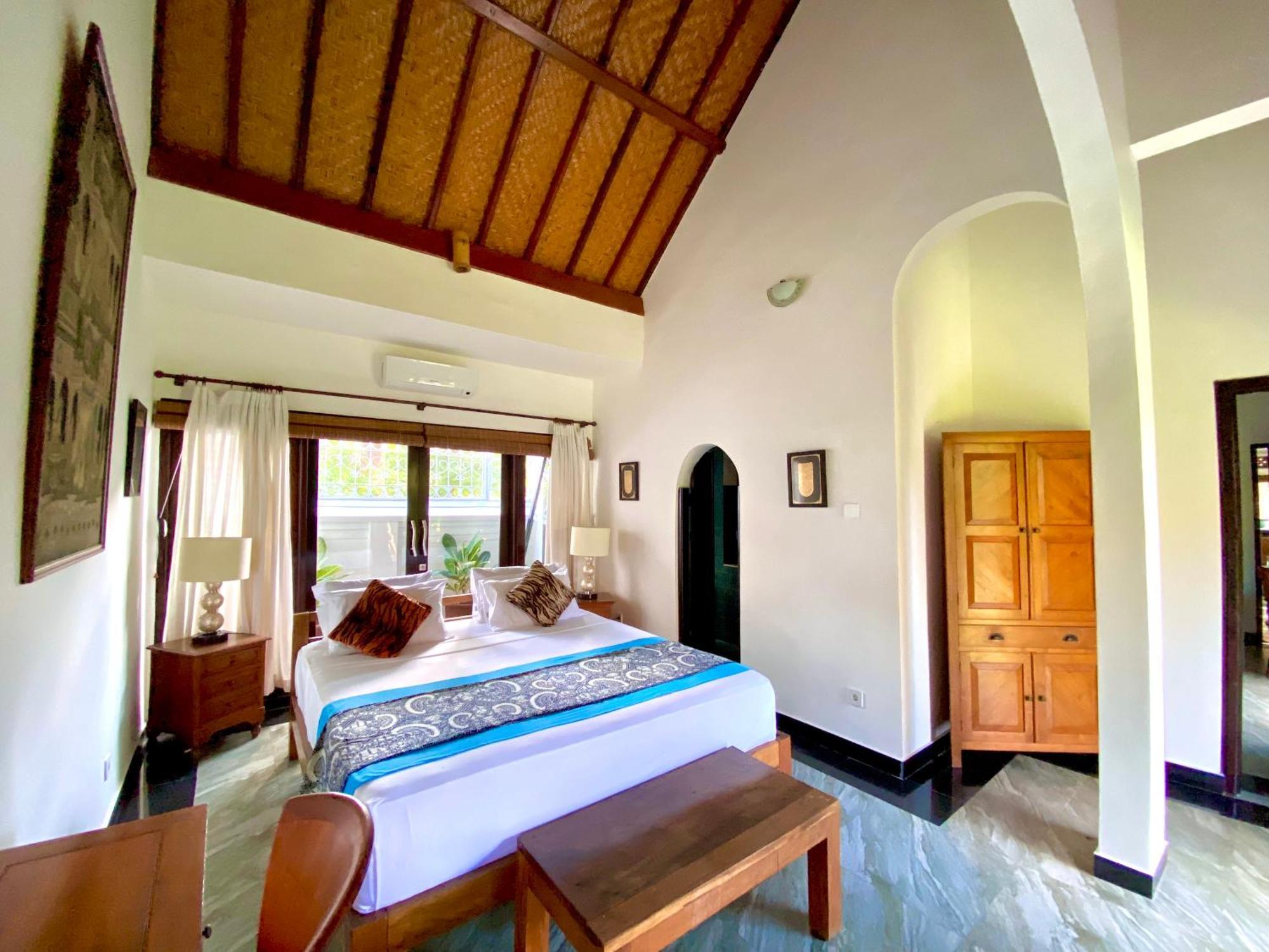 Hotel Puri Ayu à Canggu Extérieur photo